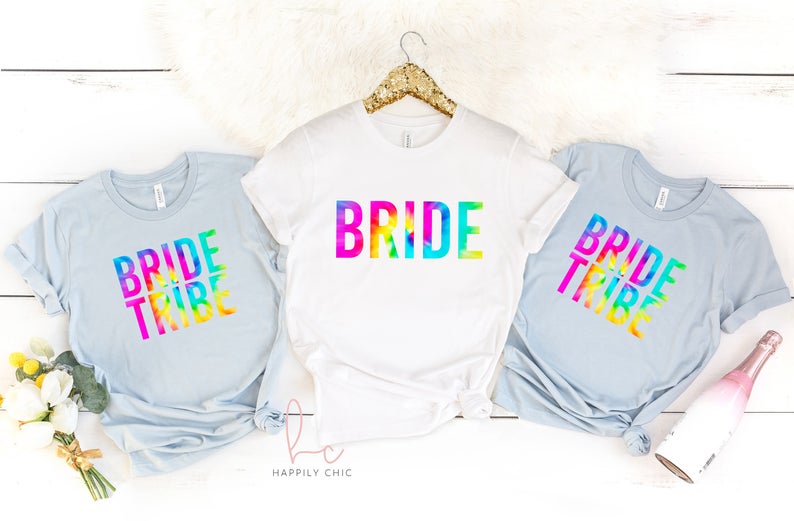 Tie dye bride tribe shirts- bachelorette trip weekend shirt ideas- bridesmaid tank tops- bridesmaid proposal gifts- bride squad unique shirt